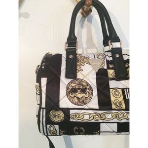 Joyrich Handbag